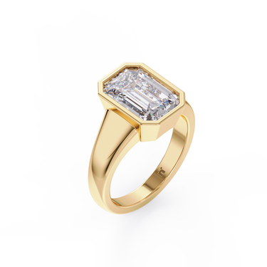 Bold Emerald Bezel Solitaire Ring